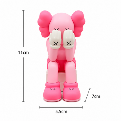 Sitting Kaws figurine